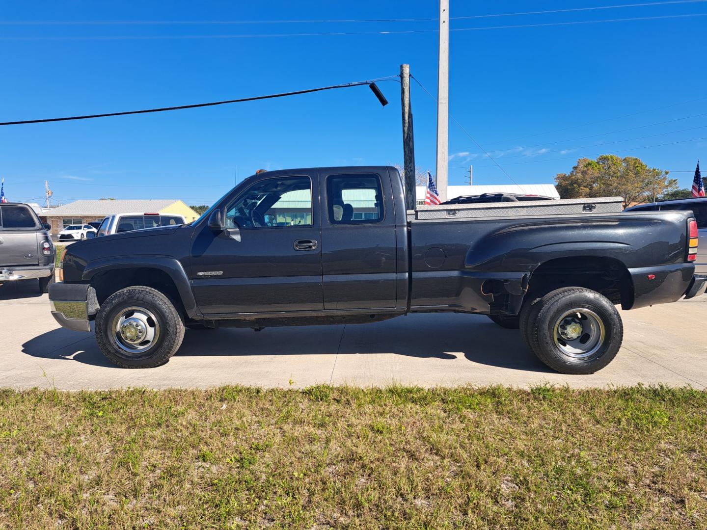 2003 Black Chevrolet Silverado 3500 Ext. Cab 2WD (1GCJC39U23E) with an 6.0L V8 OHV 16V engine, Automatic transmission, located at 1181 Aurora Rd, Melbourne, FL, 32935, (321) 241-1100, 28.132914, -80.639175 - Photo#0